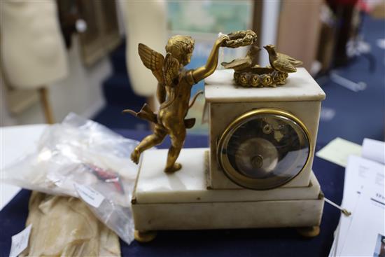 A 19th century French ormolu and white marble mantel clock, H.9in.